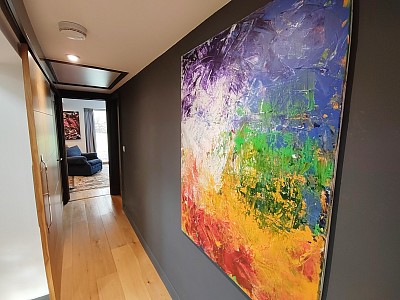 Abstract painting Reconfiguration on a grey wall showing scale